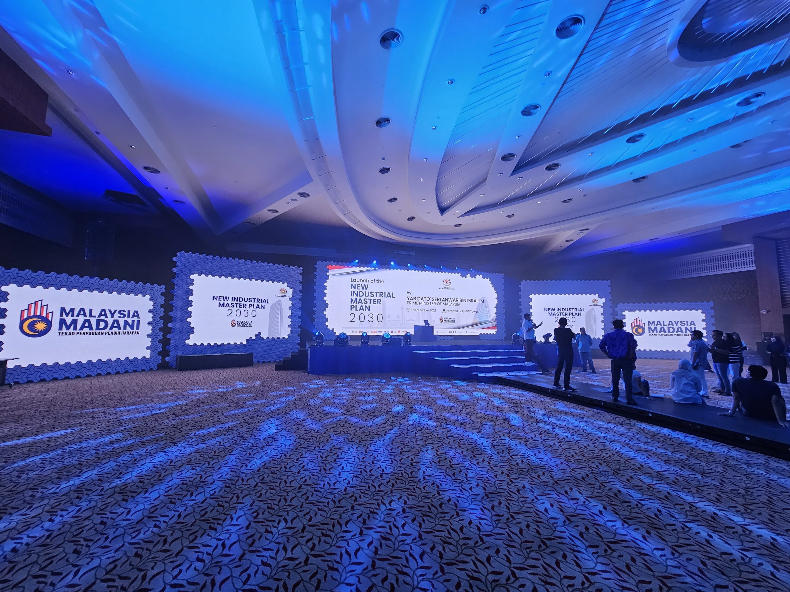 Features an indoor LED screen at an event launching the New Industrial Master Plan 2030 in Malaysia.