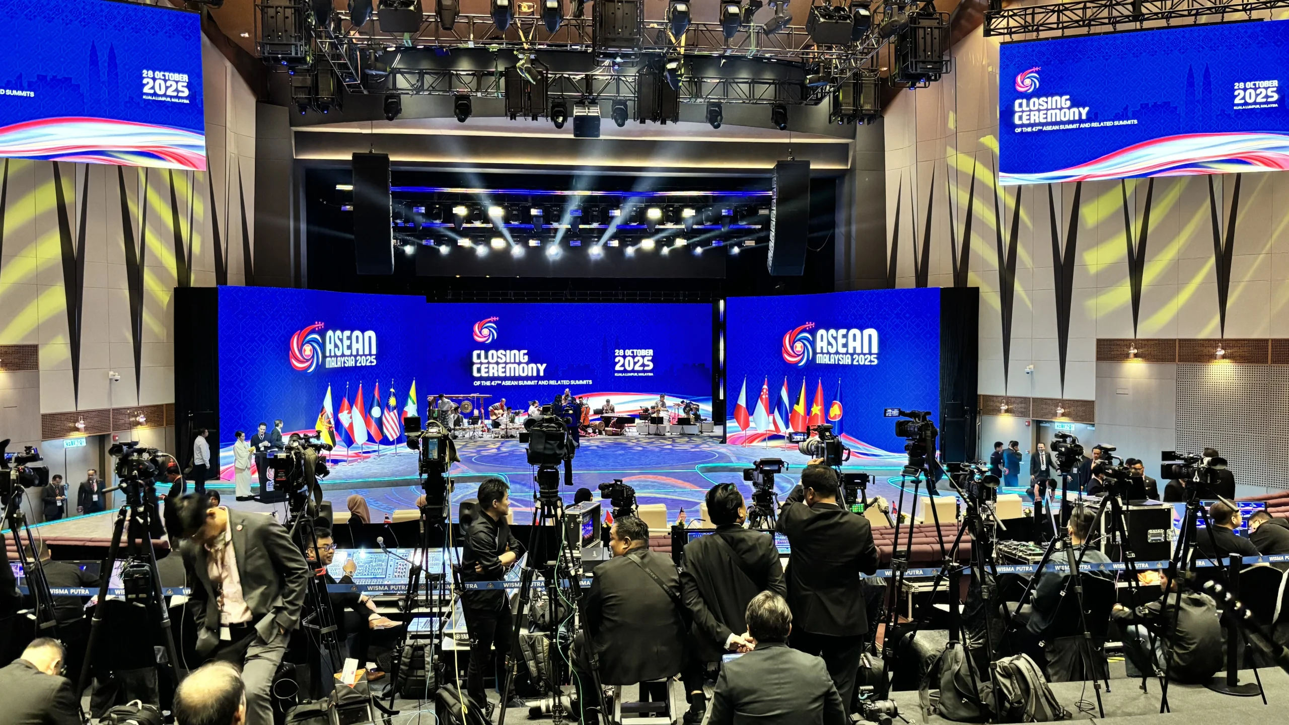 Corporate event technology questions answered with professional audiovisual equipment and LED screens.