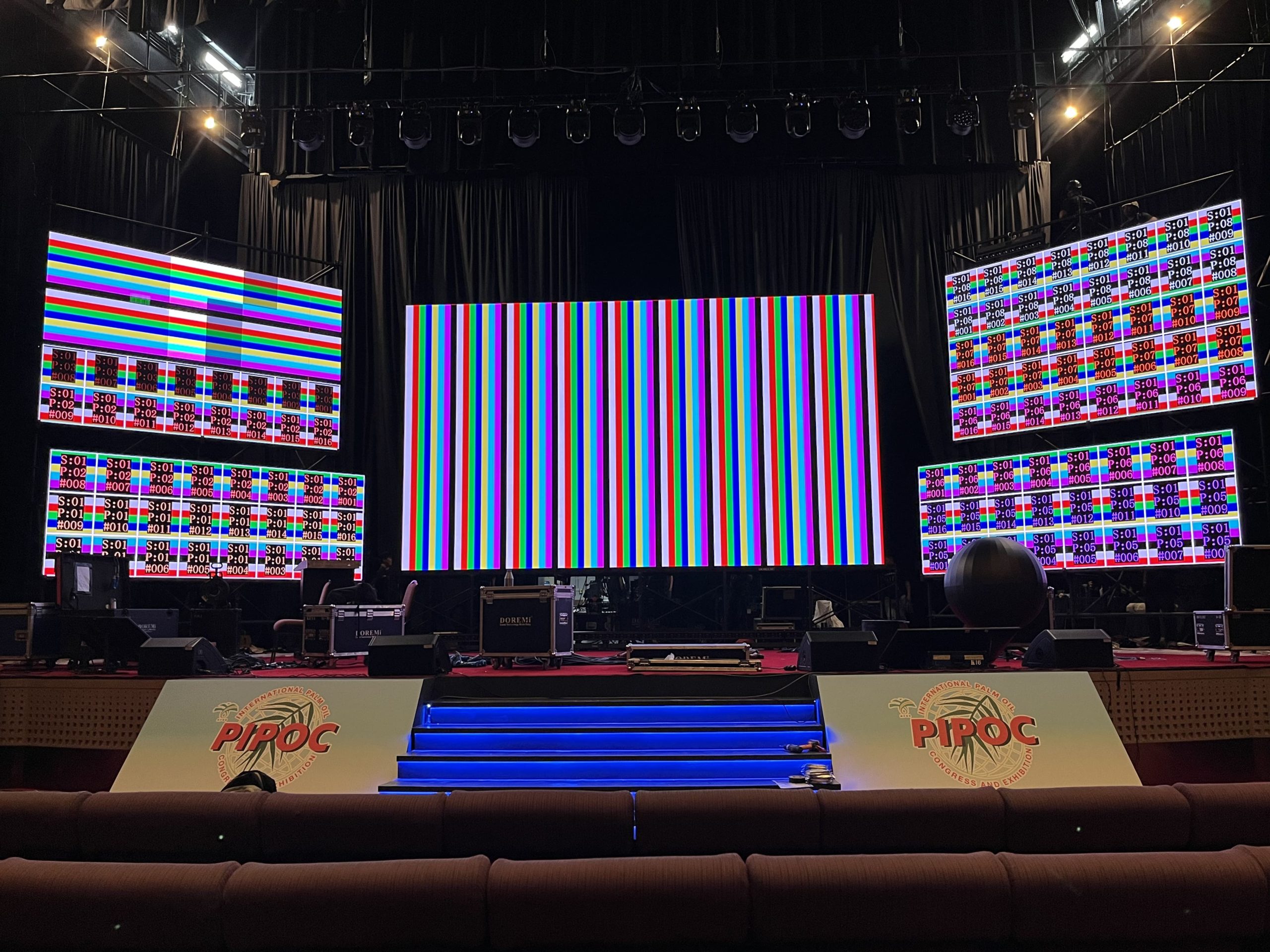 av equipment rental setup being prepared for a corporate event