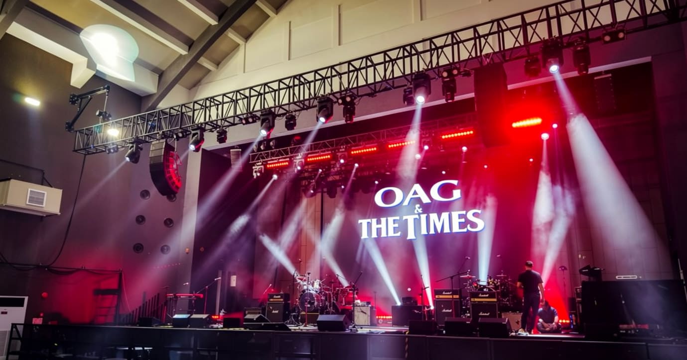 Concert stage rental setup with truss, LED screens, lighting and sound equipment