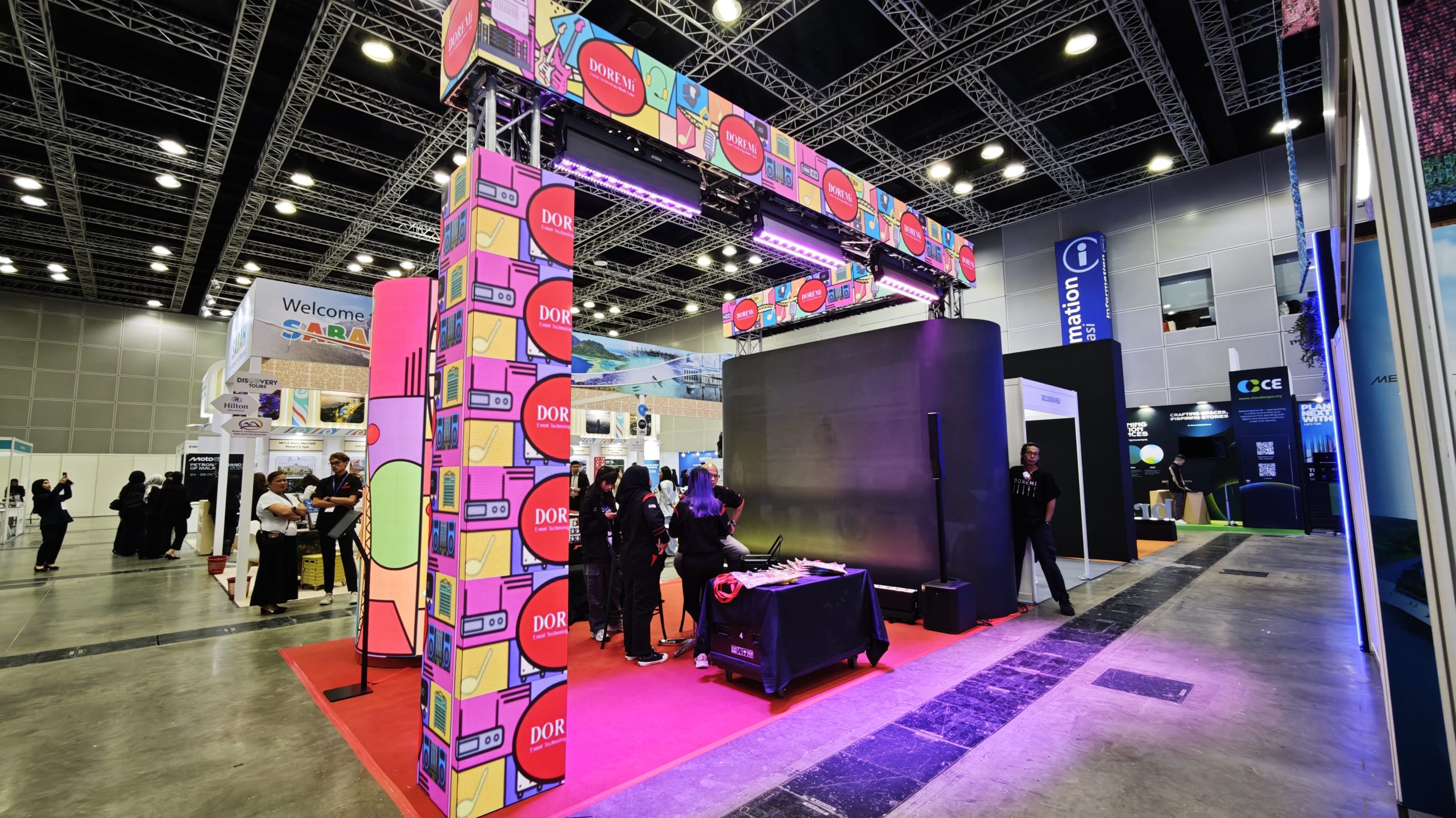 An exhibition booth featuring an LED screen for product demonstrations, brand messaging and visitor engagement at a trade show.