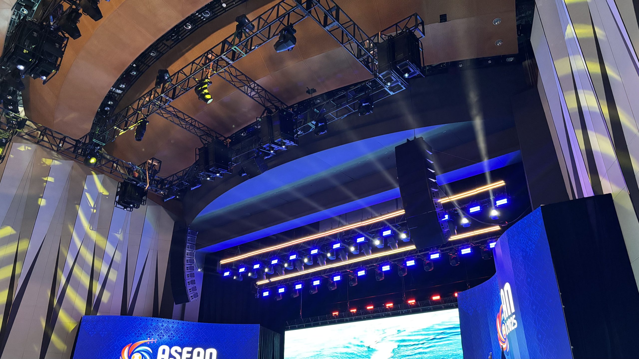 Event sound system setup with speakers positioned to provide even audio coverage across an audience area